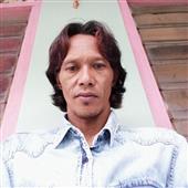 Á